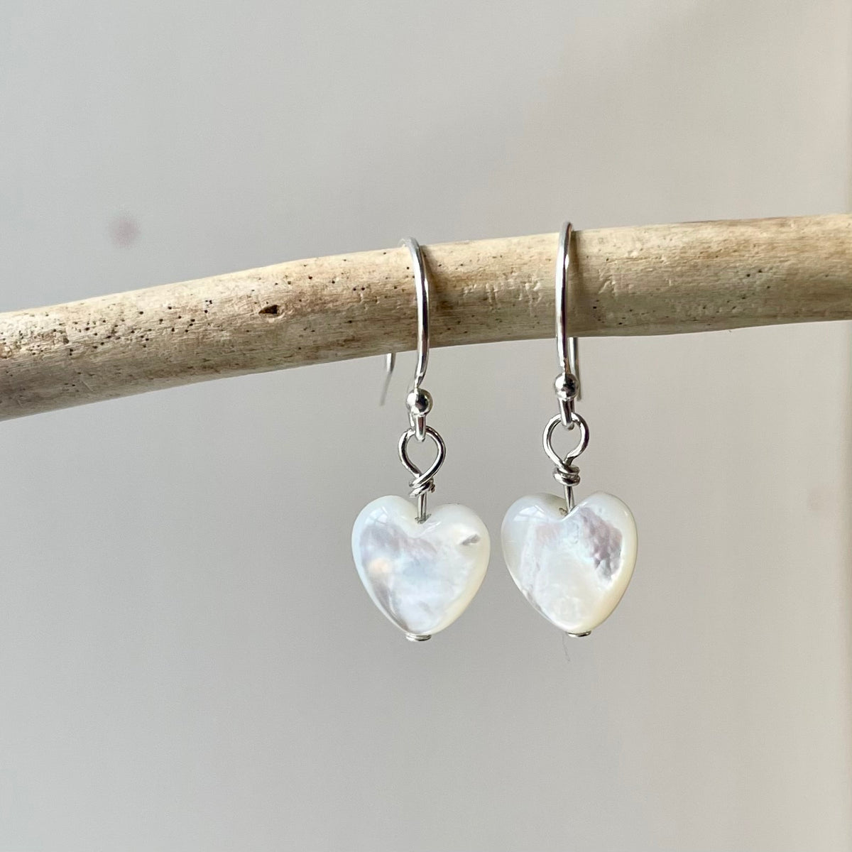 Dainty Mother of Pearl Heart Earrings image 0