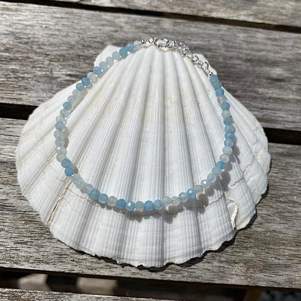 Aquamarine bracelet - made with faceted aquamarine beads and a sterling silver clasp and extender.