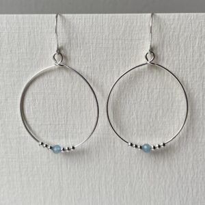 Aquamarine and sterling silver beaded hoop earrings.