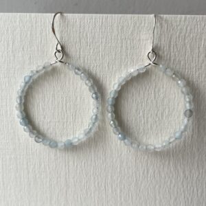 Aquamarine hoops with sterling silver ear hooks.