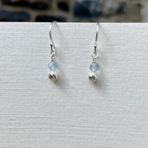 Dainty aquamarine and sterling silver earrings.