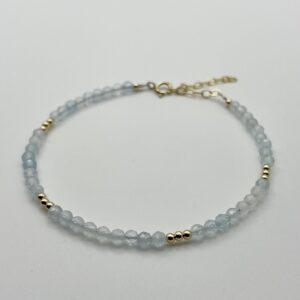 Aquamarine and gold filled beaded bracelet, handmade in England with facetted aquamarine beads.